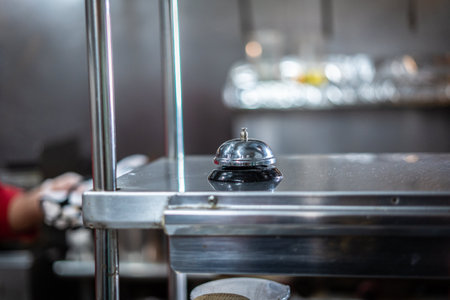 A shinny service bell in the kitchenの写真素材