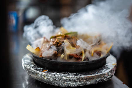 Indian kebab platter in hot sizzling plateの写真素材