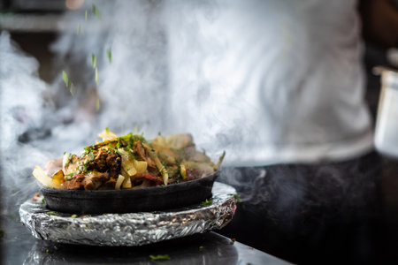 Indian kebab platter in hot sizzling plateの写真素材