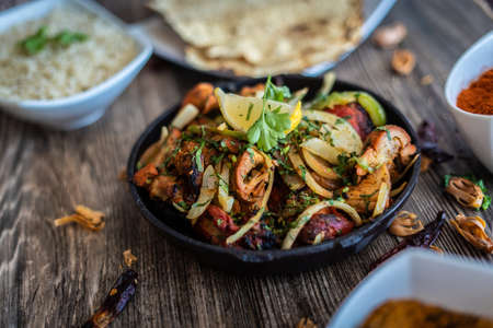 mouth watering indian restaurant food platterの写真素材