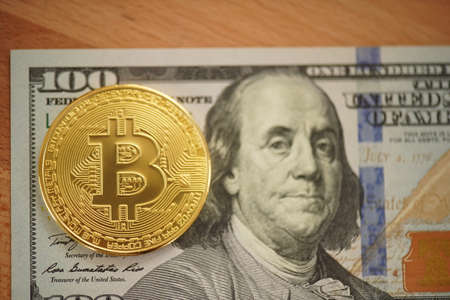 Bitcoin digital crypto currency logo with dollar bilの写真素材