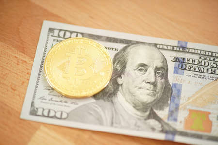 Bitcoin digital crypto currency logo with dollar bilの写真素材