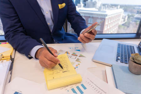 Office employee having a meeting with their teamの写真素材