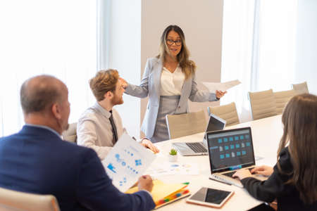 Office employee having a meeting with their teamの写真素材