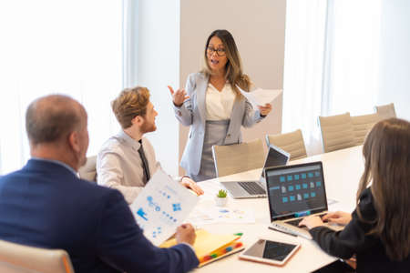 Office employee having a meeting with their teamの写真素材