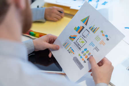 Office employee having a meeting with their teamの写真素材