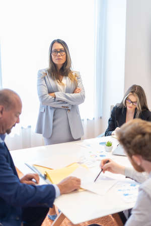 Office employee having a meeting with their teamの写真素材