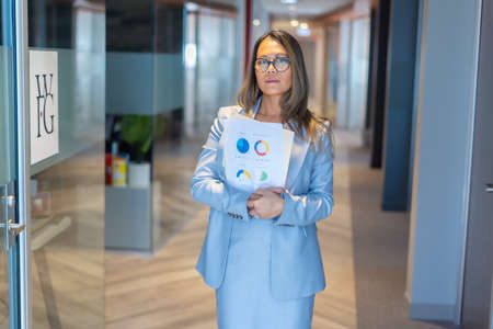 Office employee having a meeting with their teamの写真素材