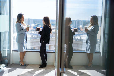 Office employee having a meeting with their teamの写真素材