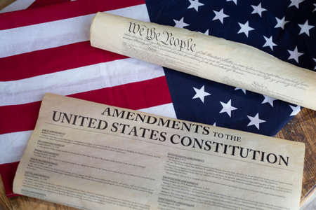 Constition of the USA with US flag