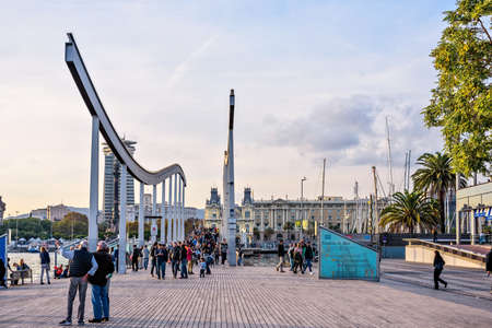 Barcelona, Spain: November 13, 2016: Rambla del Mar wooden walkway over Port Vell at sunsetのeditorial素材