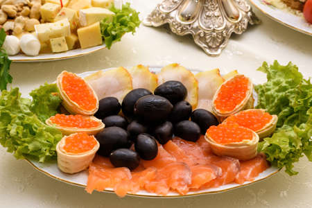Red caviar with smoked salmon snack. Russian cuisine appetizerの写真素材