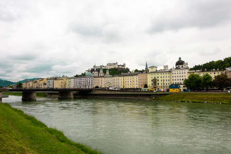 Salzach River in Salzburg, Austria. Famous   Heritage Festung Hohensalzburg, Salzburger Land, Austria, Europe on May 19th 2016のeditorial素材