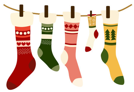 Composition of woolen christmas themed socks hung with clothespin on a wireのイラスト素材