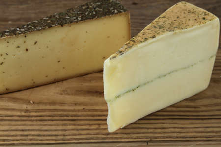 Swiss cheese on wooden table