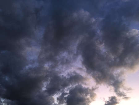 Dramatic clouds formation at sunset