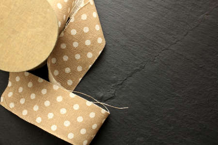 Brown tape on a wooden background with space for your messageの写真素材