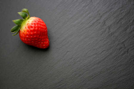 Strawberry on a slate backgroundの写真素材