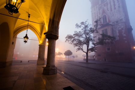 Arch on the market square in Krakow at morning fog, Polandの写真素材