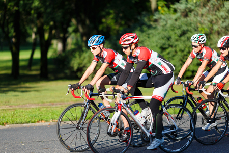 Budapest, Hungary, September 12 2014: Cyclists riding bicycles in a park near the Castle Vajdahunyad in Budapestのeditorial素材