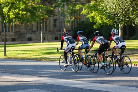 Budapest, Hungary, September 12 2014: Cyclists riding bicycles in a park near the Castle Vajdahunyad in Budapestのeditorial素材