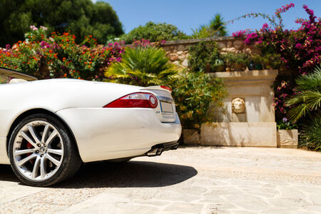 Santanyi, Mallorca, July 21 2014: White car in the sunny courtyardのeditorial素材