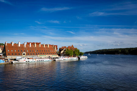 Mikolajki, Masuria, Poland, June 12 2014: Port in Mikolajki at summer sunny day, the Masurian Lakes district in Northern Polandのeditorial素材