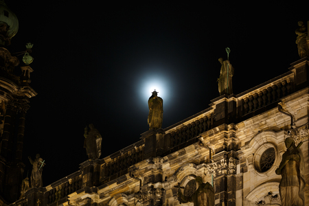 Sculpture in the moonlight on the roof of Hofkirche in Dresden, Germanyのeditorial素材