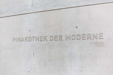 Munich, Germany - January 03 2016: Sign on the wall of Pinakothek der Moderne museum, situated in the city centre of Munichのeditorial素材