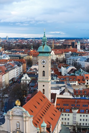 Munich, Germany - January 04 2016: View of the tower of Heilig Heist Church from tower of St.Peter Church, evening timeのeditorial素材