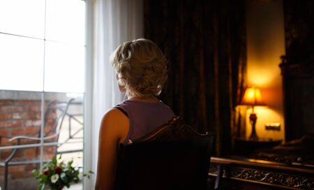 Bride waiting for make up before the celebrationの写真素材