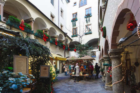 Salzburg, Austria - January 07 2016: Christmas fair in a narrow street of city