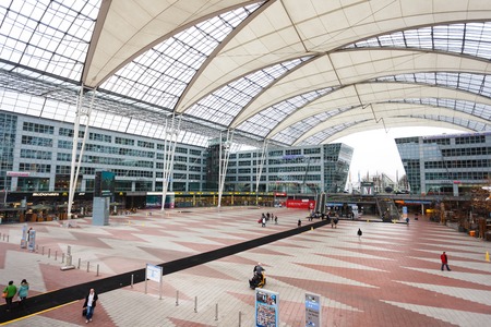 Munich, Germany - January 08 2016: People in modern glass interior of Munich airportのeditorial素材