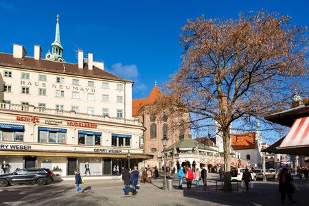 Munich, Germany - January 08 2016: People walk on the square of Viktualienmarkt, famous food market in the center of Munichのeditorial素材