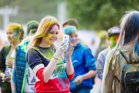 Kaliningrad, Russia - June 12 2016: Young people joyfully celebrate The Festival of Paints during the Day of Russiaのeditorial素材