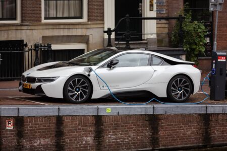 Amsterdam, Netherlands - July 01 2016: BMW i8 car being charged on a street of Amsterdamのeditorial素材