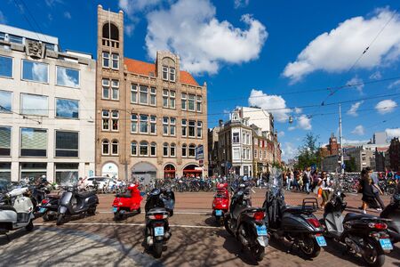 Amsterdam, Netherlands - July 03 2016: Parked bikes on the Koningsplein street, summer timeのeditorial素材