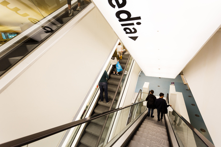 Amsterdam, Netherlands - July 02 2016: Some people on escalator in the Public Library Amsterdam, the best library of Netherlandsのeditorial素材