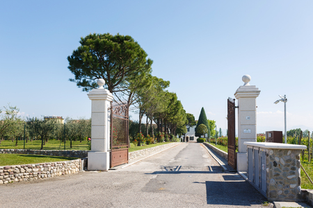 Desenzano del Garda, Italy - May 07 2016: The gate to the factory for the production of wine Ca Maiol, located in a North Italyのeditorial素材