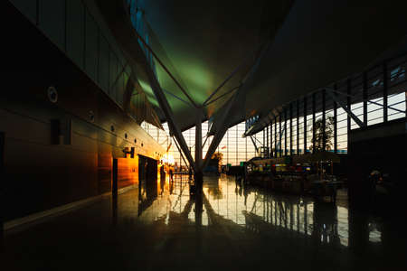 Gdansk, Poland, May 09 2016: Interior of modern building of Lech Valesa airport in Gdansk at sunset timeのeditorial素材