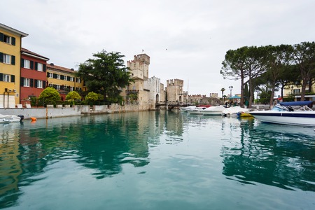 Sirmione, Italy - May 09 2016: Castle of Scaligero in the bay, the main landmark of Sirmione townのeditorial素材