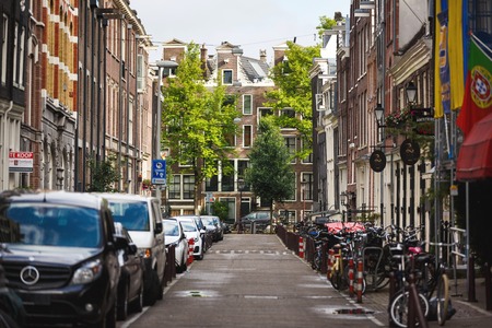 Amsterdam, Netherlands - July 03 2016: The traditional Dutch houses on Kerkstraat street, evening timeのeditorial素材