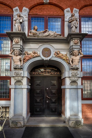 Gdansk, Poland - October 04 2016: The ornamental wooden doors in old city of Gdansk