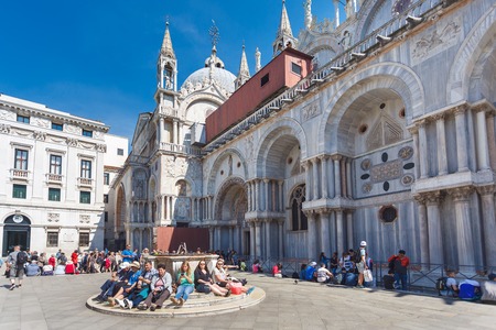 Venice, Italy - May 05 2016: Tourists are resting on the Marco Polo square at spring timeのeditorial素材