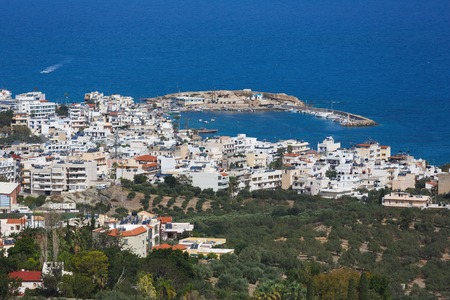 Cityscape of Hersonissos, the small resort town of Crete, Greeceの写真素材