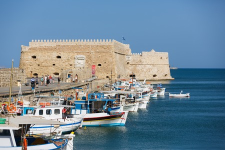 Heraklion, Greece - October 12 2016: Fishing boats moored in the port of Heraklion, autumn timeのeditorial素材