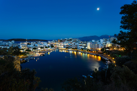 Agios Nikolaos, Greece - October 13 2016: Night lights of the spa town, the view from the highest point in eveningのeditorial素材