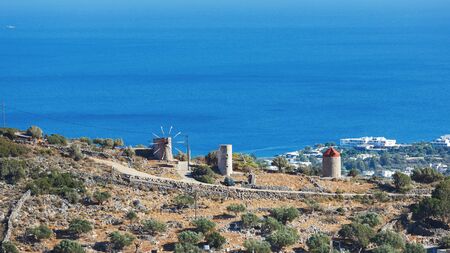 The old windmills on a plateau in Crete, Greece