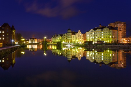 Kaliningrad, Russia - November 28 2016: The reflection of the Fishing Village in a river in evening