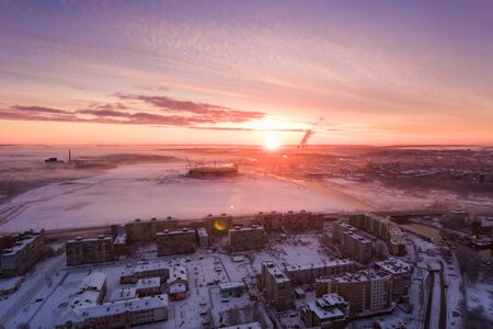 Sunrise over the city of Kaliningrad in the early morning in winter, view from above